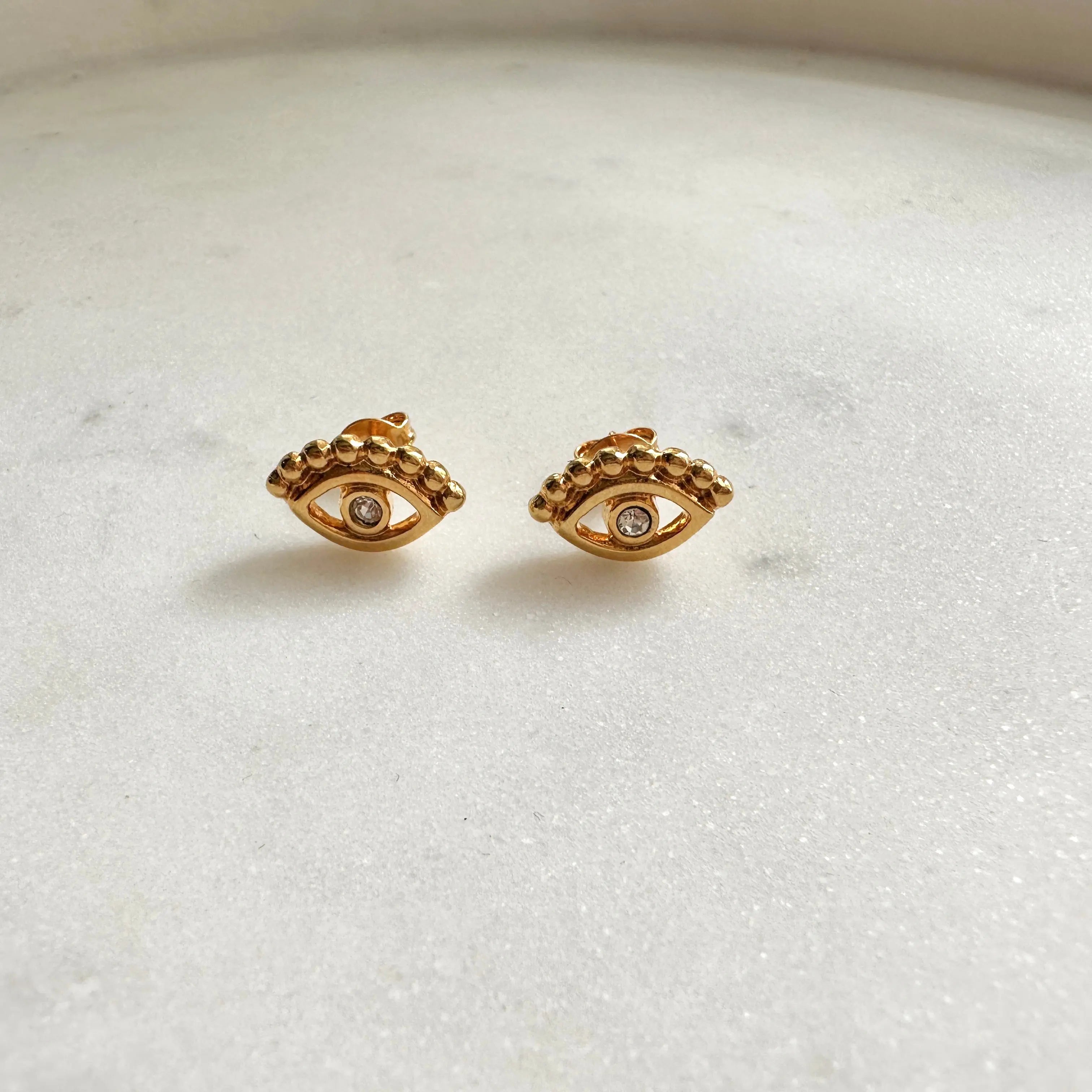 Aretes Ojito piedrita blanca Aretes Gold Muun Jewelry