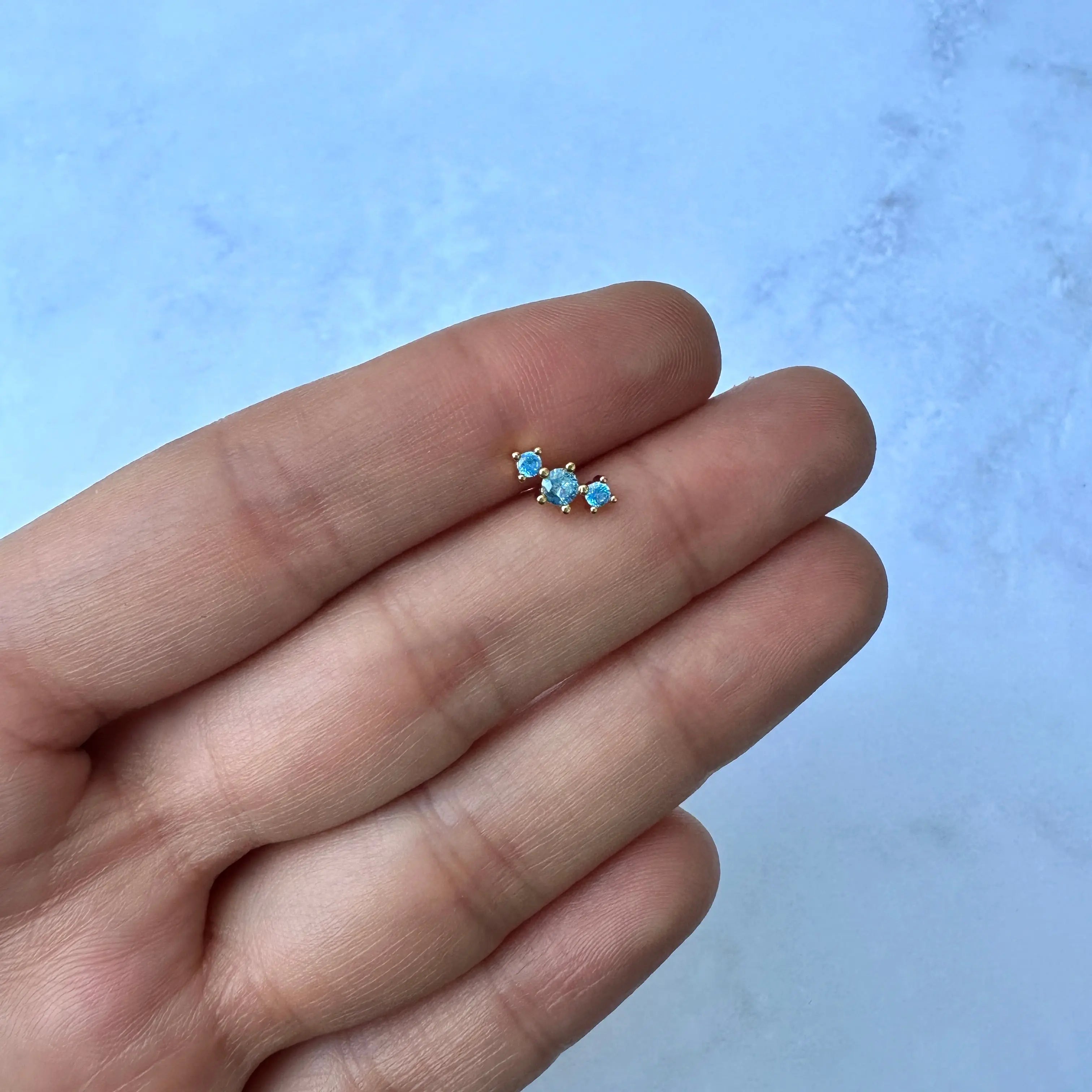 Piercing Acero Barrita zirconias azul dorado Muun Jewelry