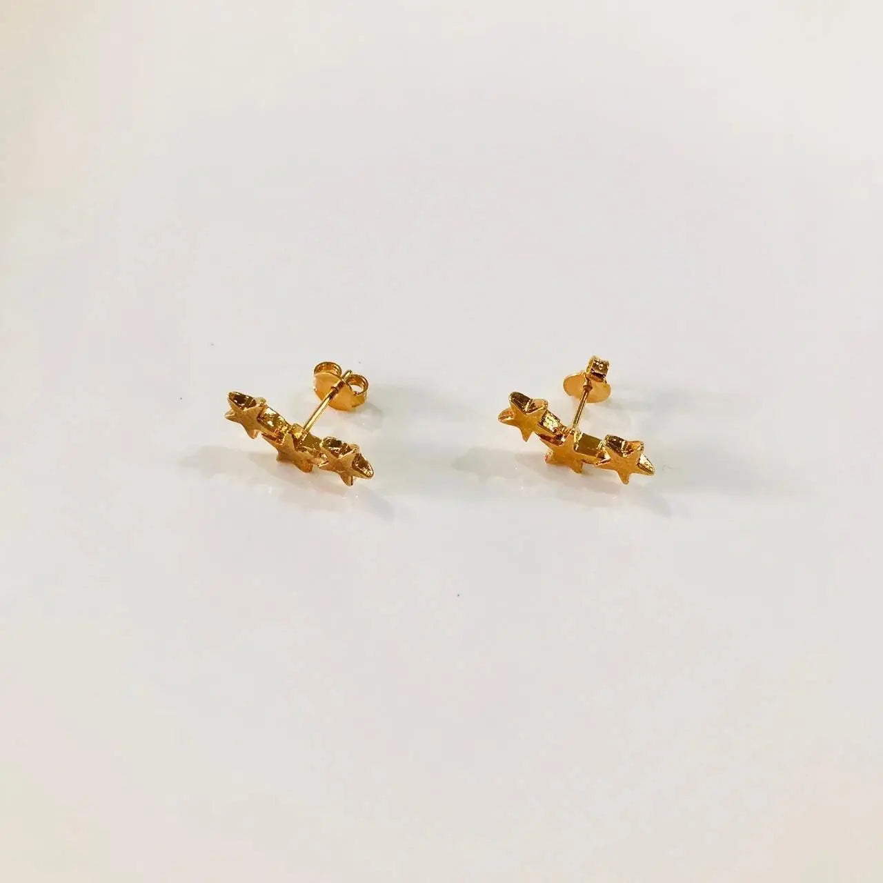 Aretes Tres estrellas Aretes Gold  Muun Jewelry